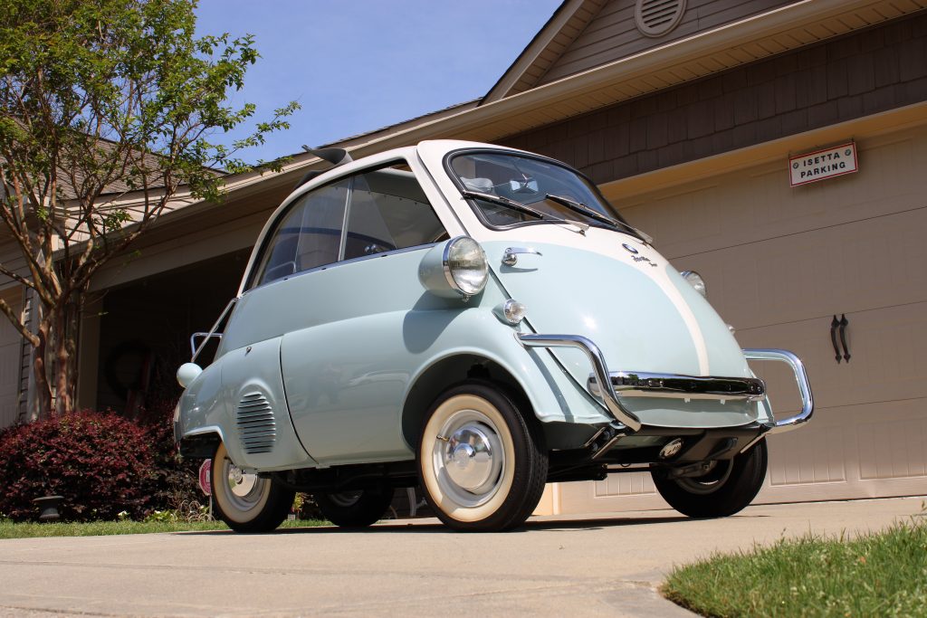 Baby blue vintage car with white accents